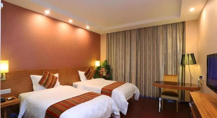 Bed in Nanfang Dasha Hotel