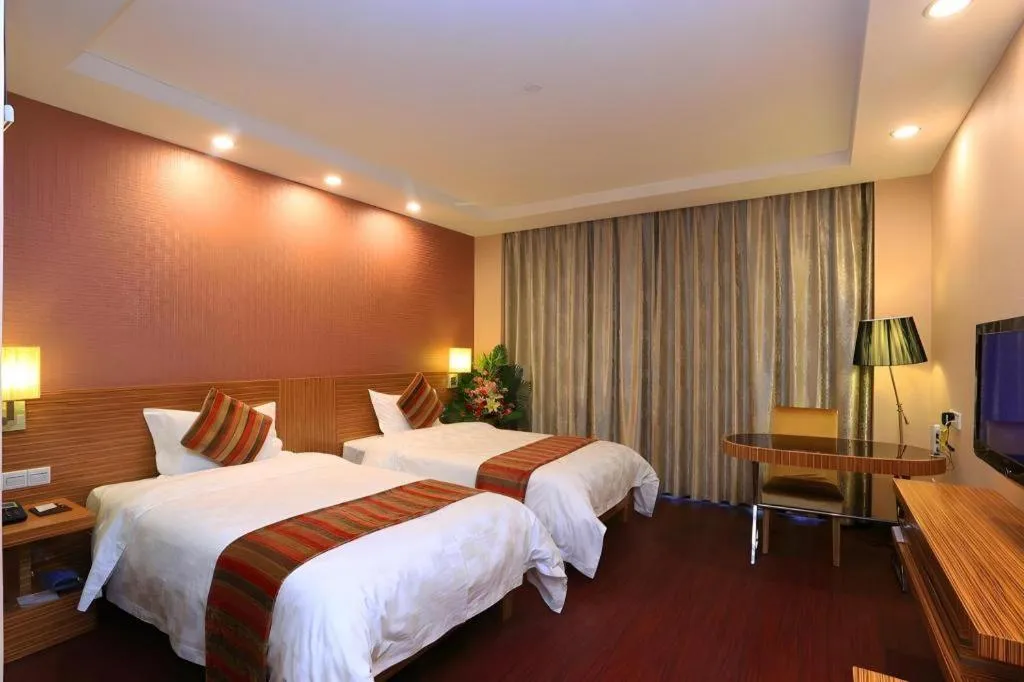 Bed in Nanfang Dasha Hotel