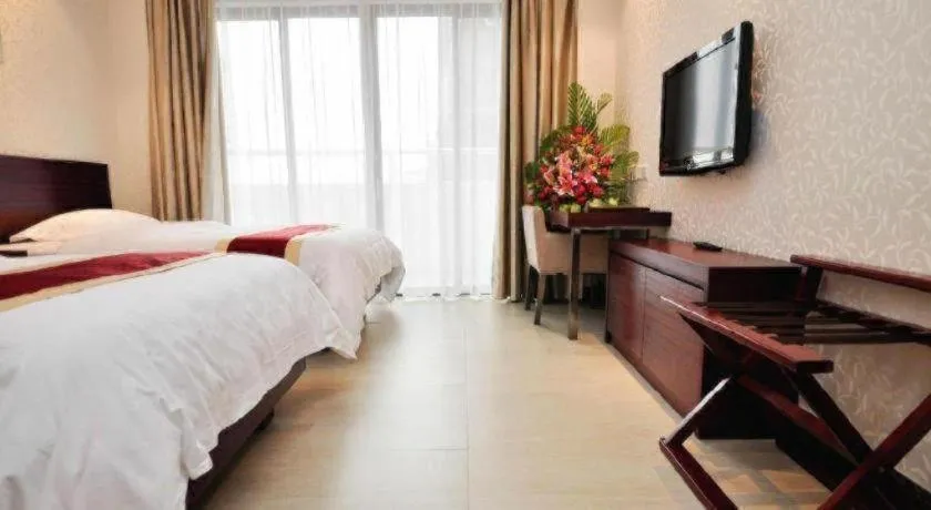 Bed in Nanfang Dasha Hotel