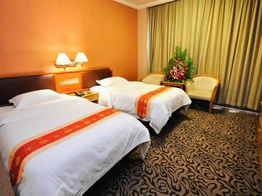 Bed in Nanfang Dasha Hotel