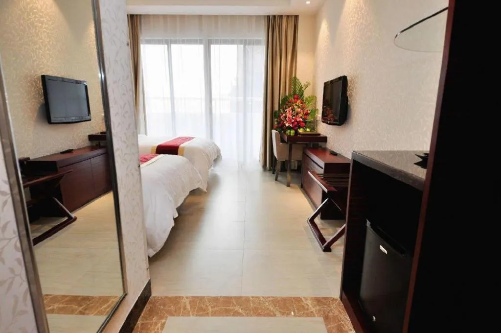 Bed in Nanfang Dasha Hotel