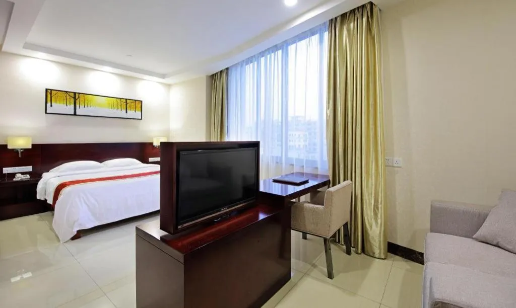 Bed in Nanfang Dasha Hotel