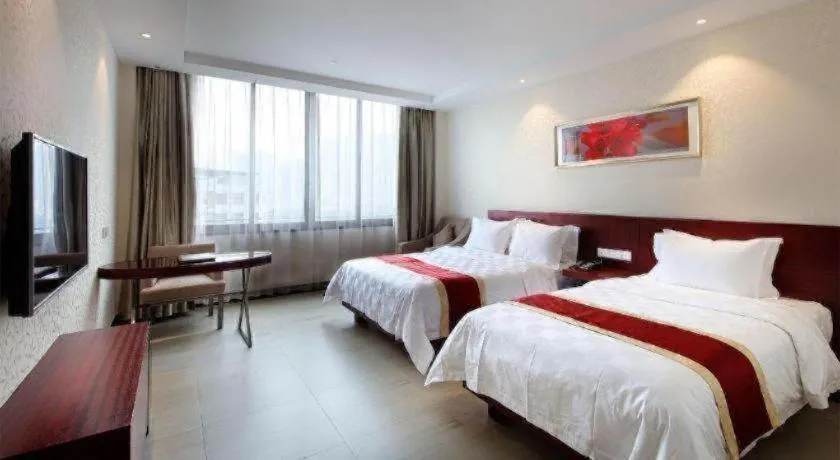 Bed in Nanfang Dasha Hotel