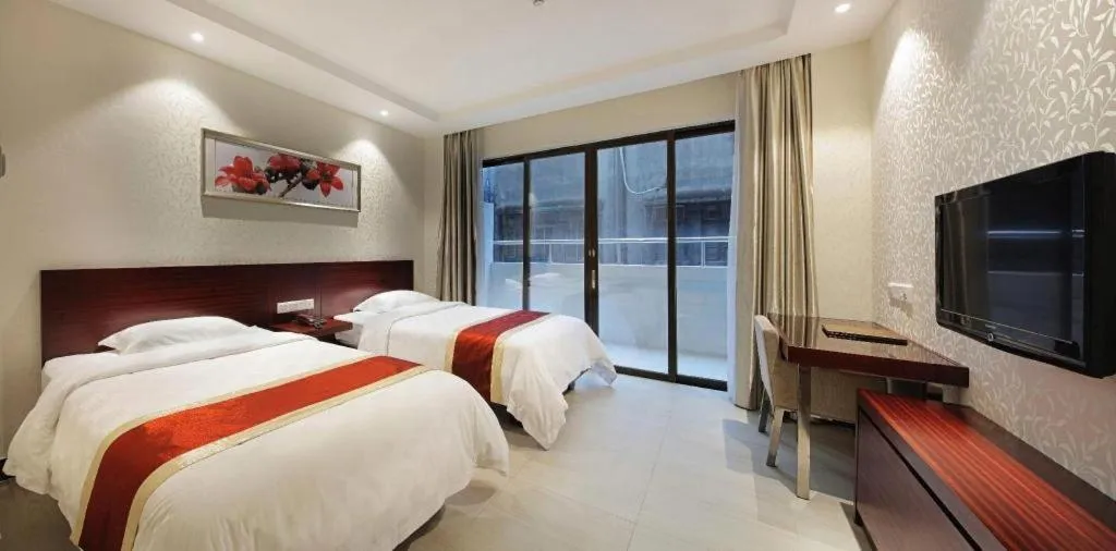 Bed in Nanfang Dasha Hotel