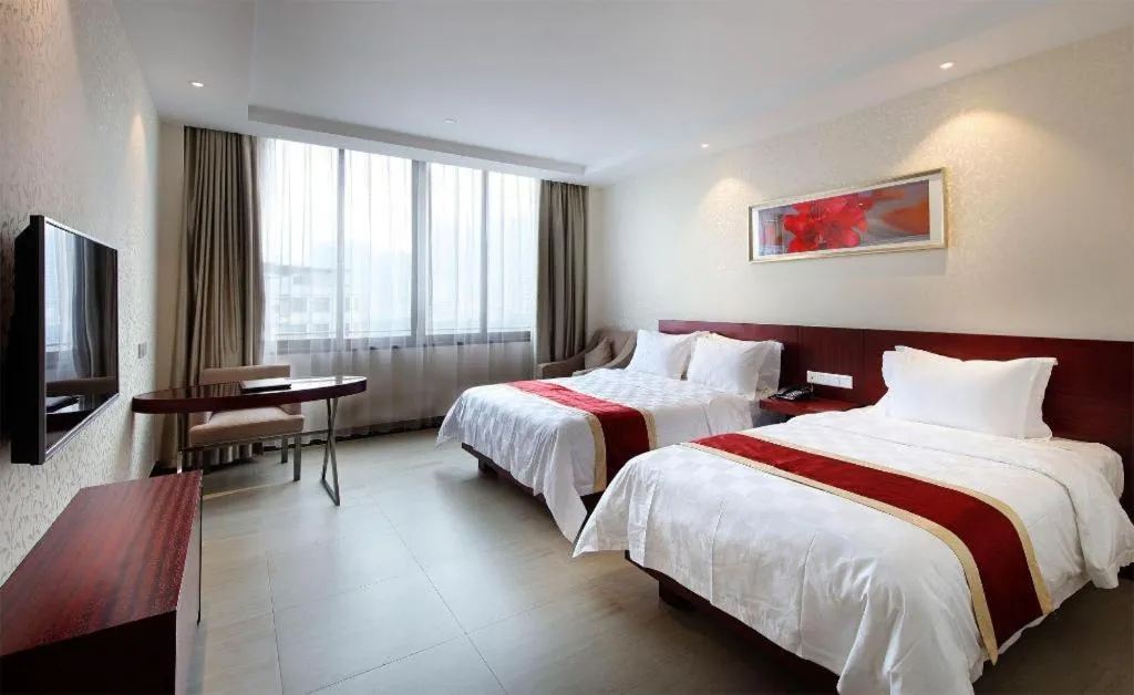 Bed in Nanfang Dasha Hotel