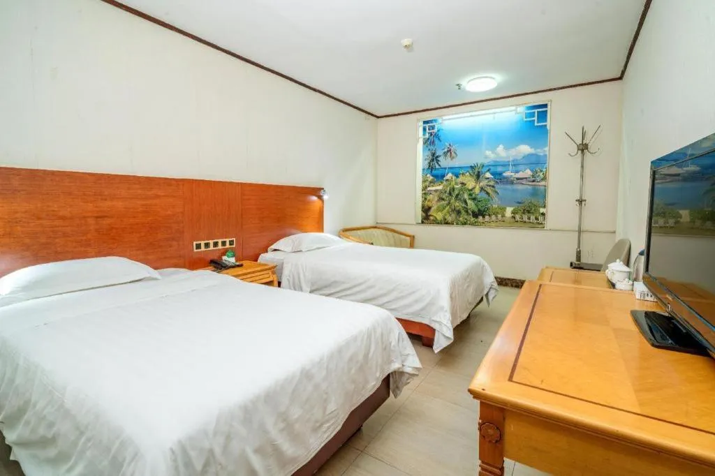 Bed in Nanfang Dasha Hotel