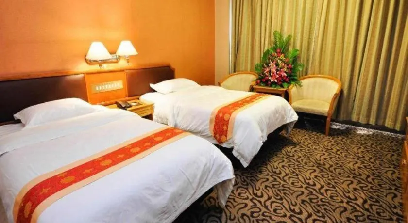 Bed in Nanfang Dasha Hotel