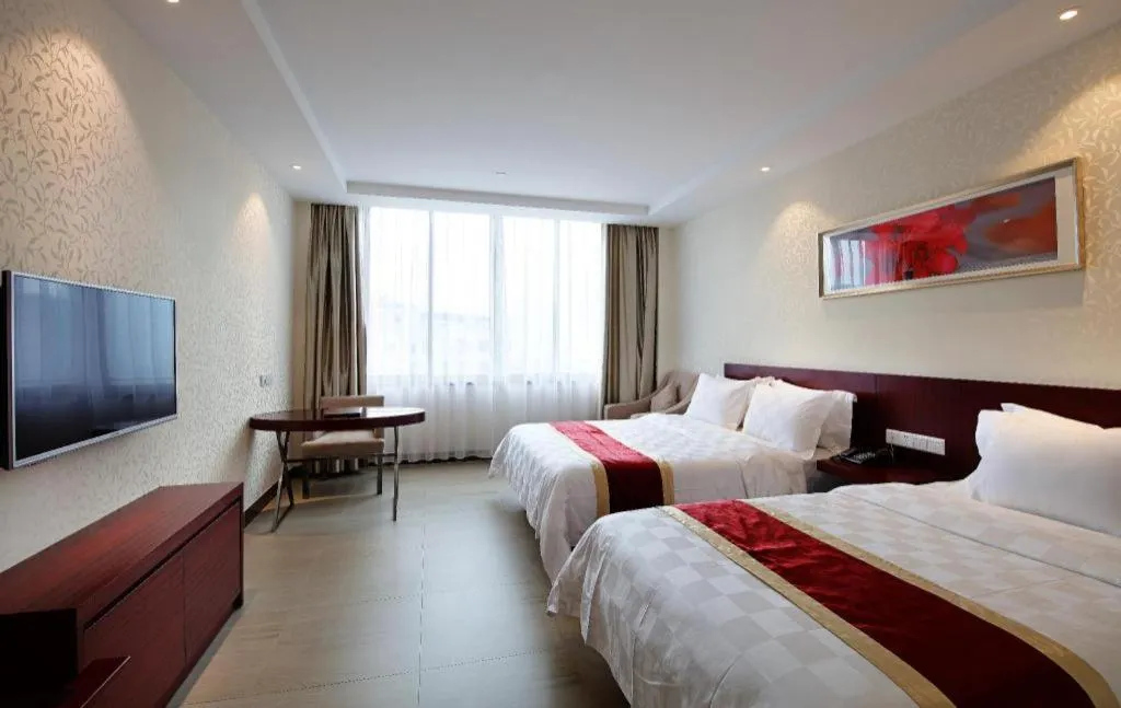 Bed in Nanfang Dasha Hotel