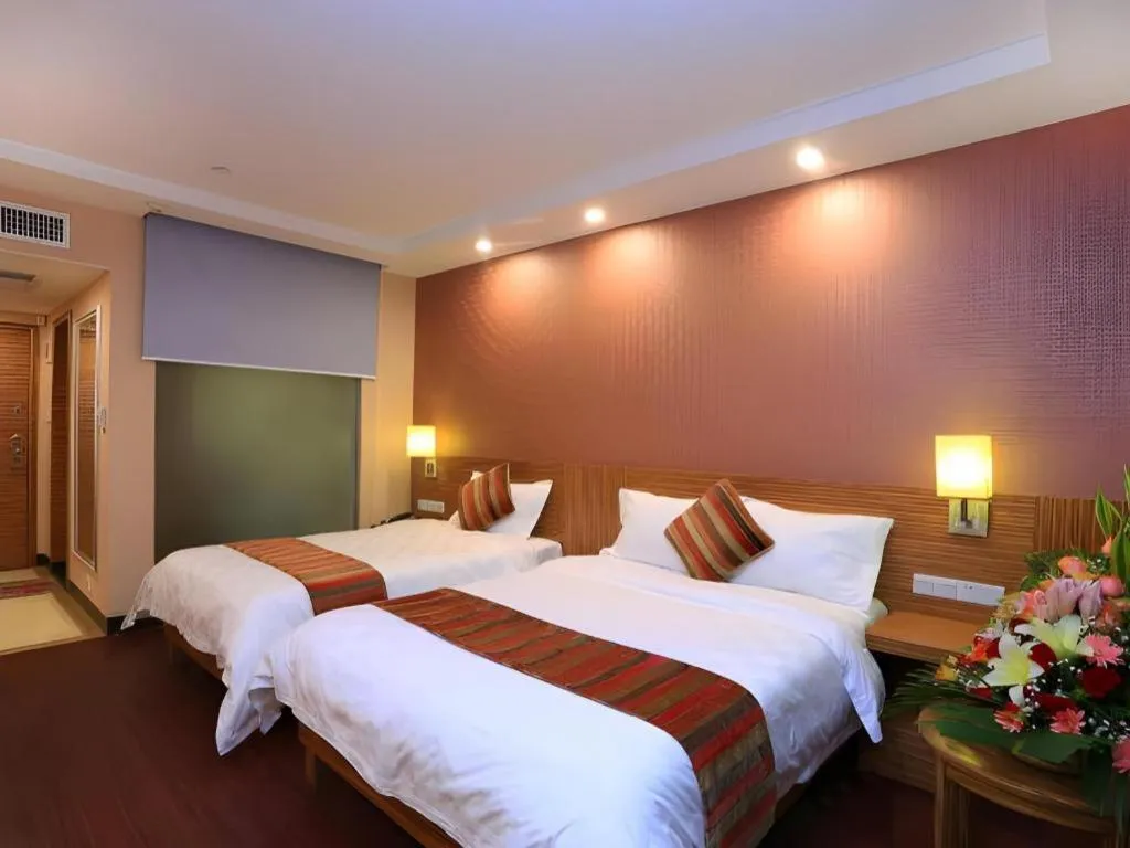 Bed in Nanfang Dasha Hotel