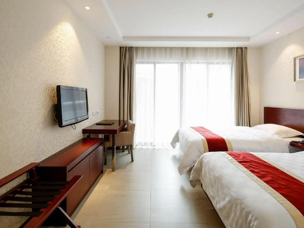 Bed in Nanfang Dasha Hotel