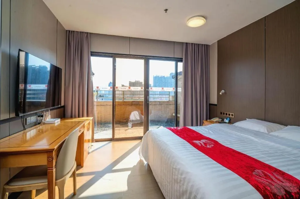 Bed in Nanfang Dasha Hotel