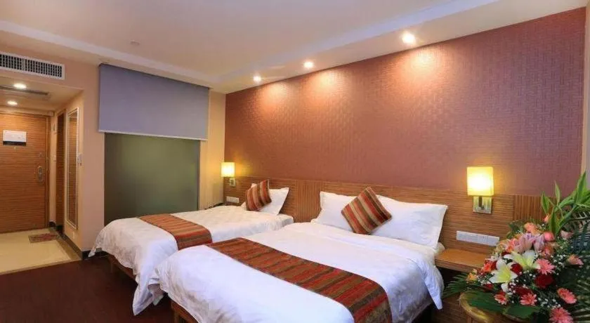 Bed in Nanfang Dasha Hotel