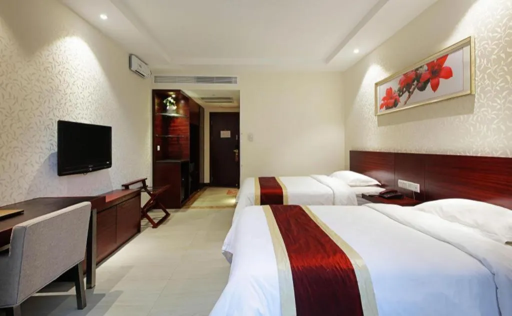 Bed in Nanfang Dasha Hotel