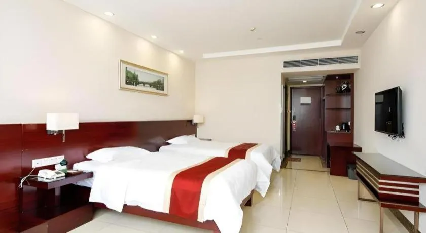 Bed in Nanfang Dasha Hotel