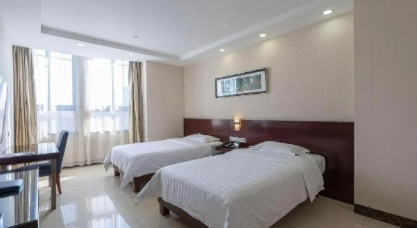 Bed in Nanfang Dasha Hotel