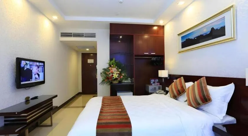 Bed in Nanfang Dasha Hotel