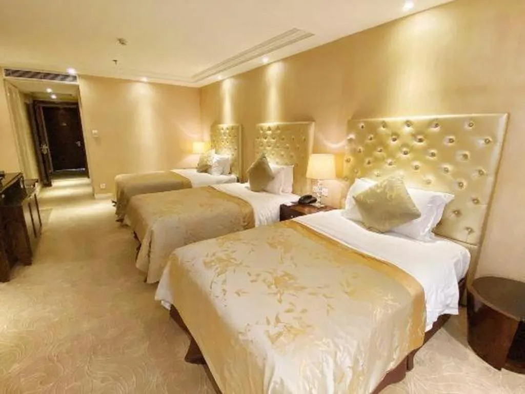 Bed in Dongfang Jianguo Hotel Wuhan