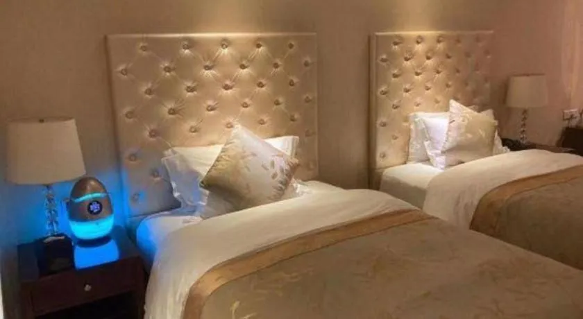 Bed in Dongfang Jianguo Hotel Wuhan