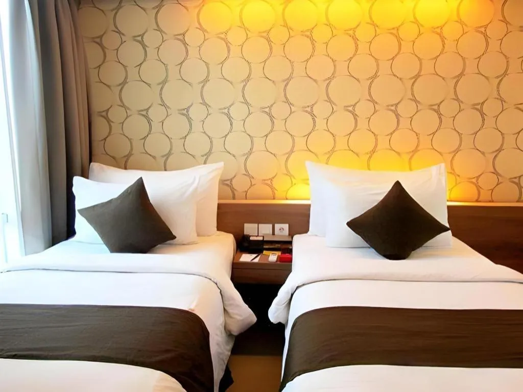 Bed in d'primahotel Mega Kuningan