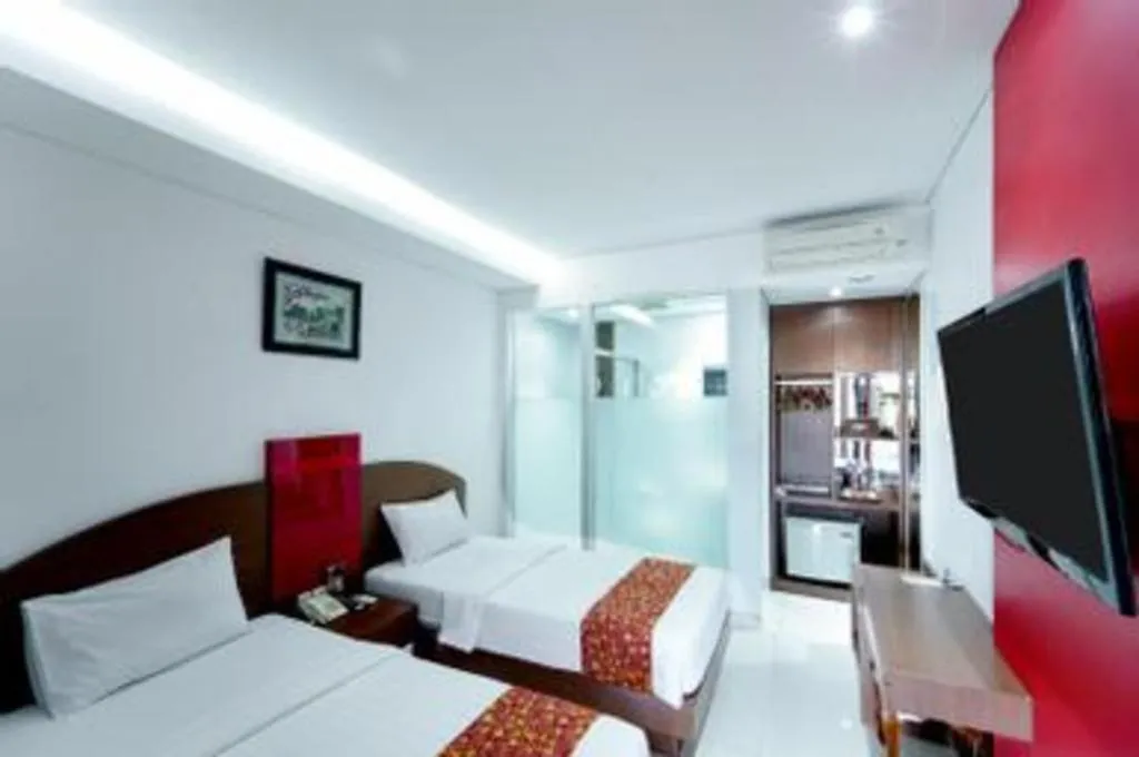 Bed in Kenari Asri Hotel