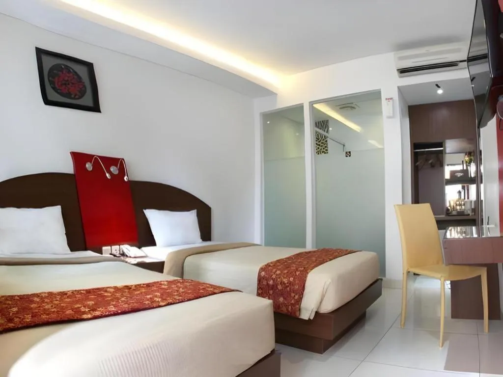 Bed in Kenari Asri Hotel