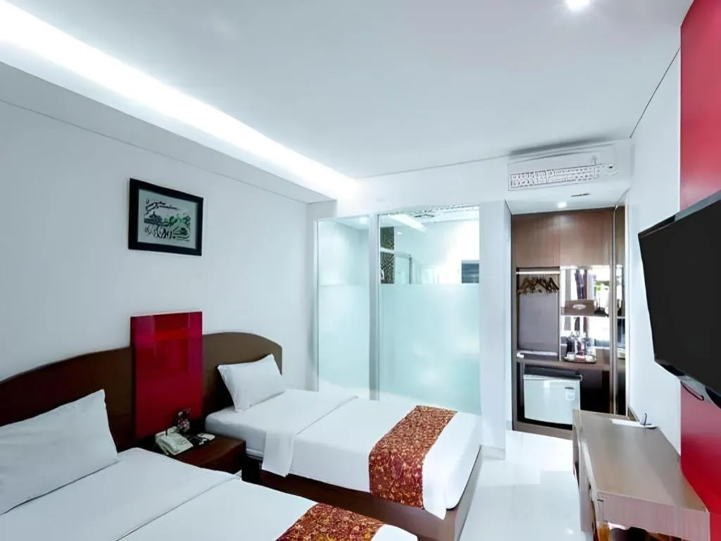 Bed in Kenari Asri Hotel