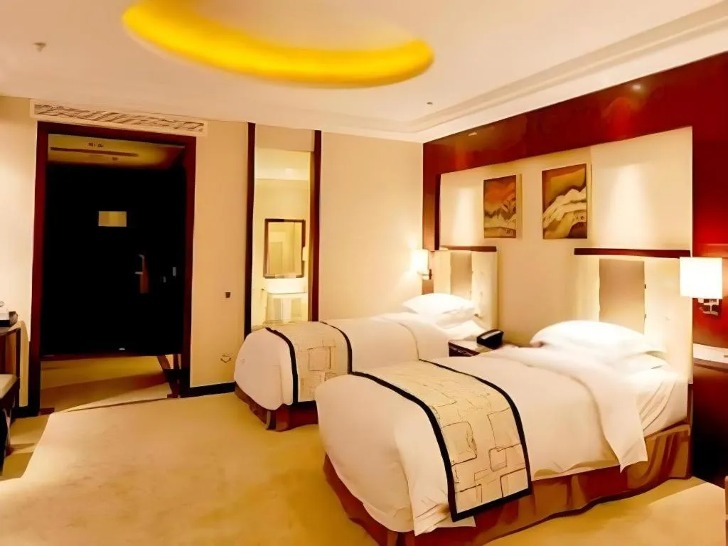 Bed in Northwest Petroleum Hotel