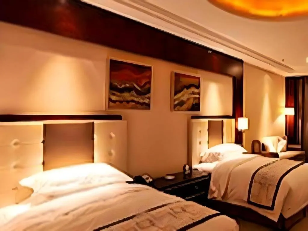 Bed in Northwest Petroleum Hotel