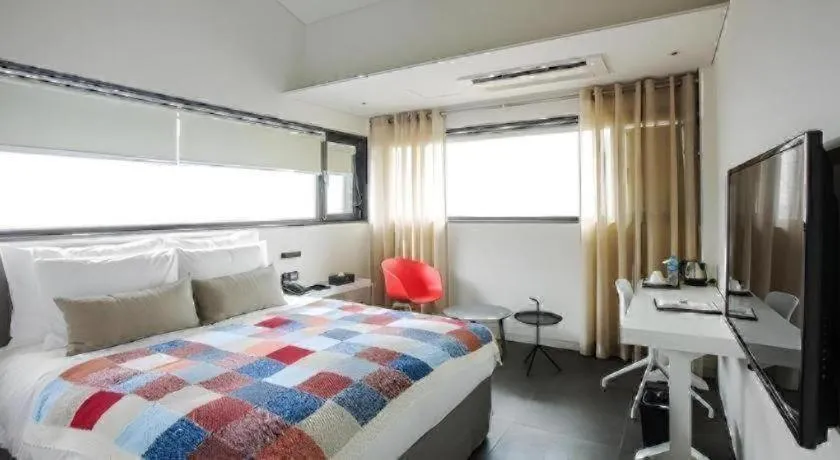 Bed in Everrich Hotel