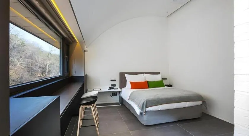 Bed in Everrich Hotel