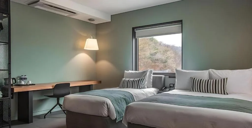 Bed in Everrich Hotel