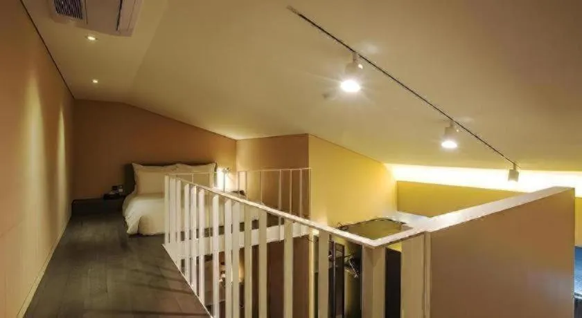 Bed in Everrich Hotel