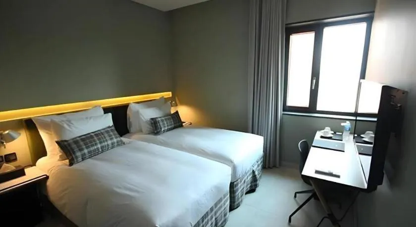 Bed in Everrich Hotel