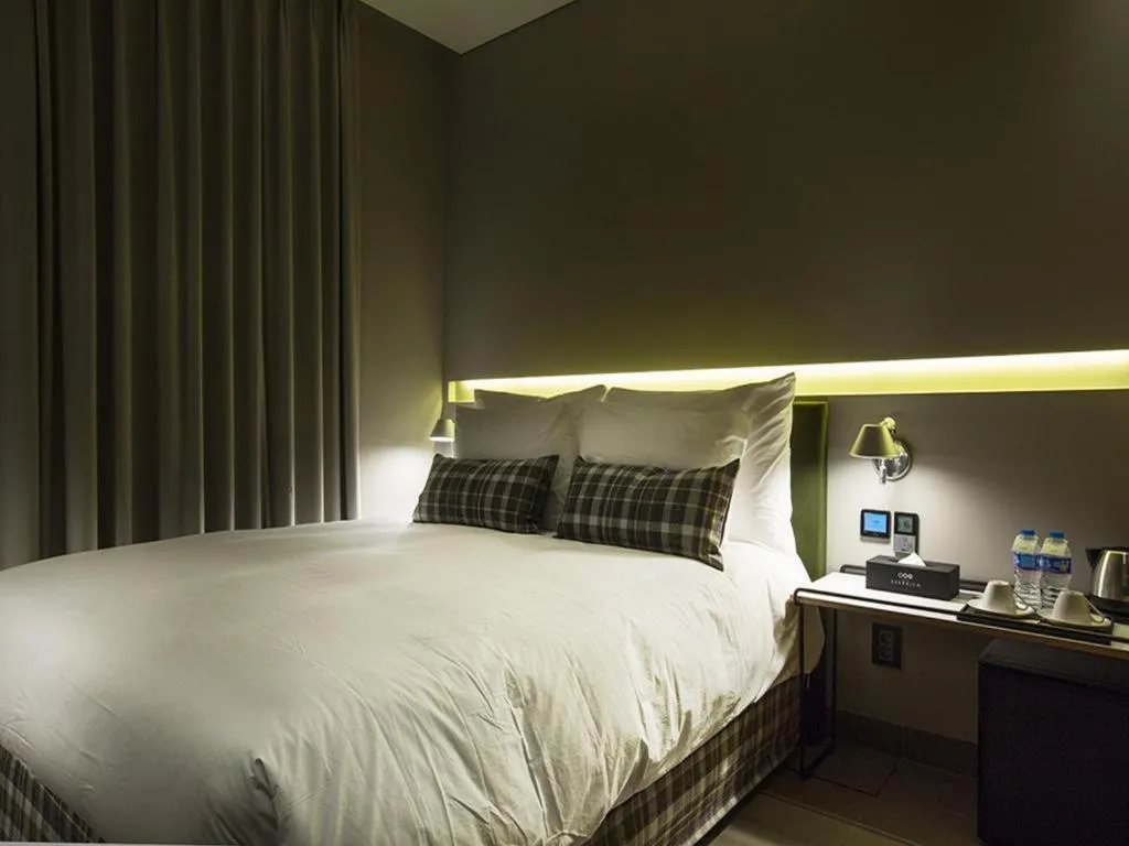 Bed in Everrich Hotel