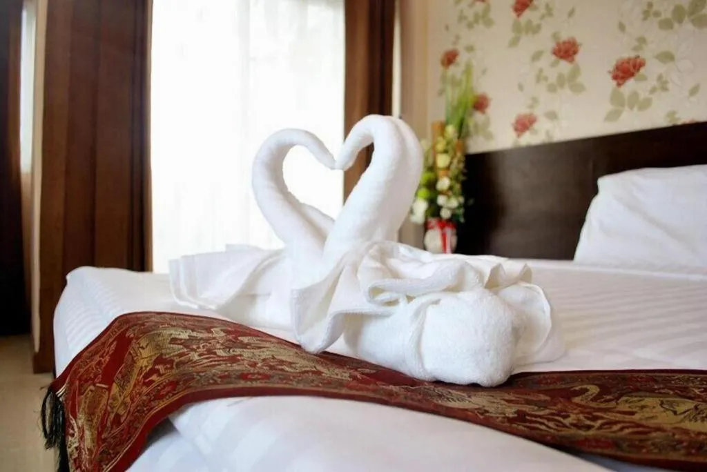 Bed in Le Parc Wangnang Hotel