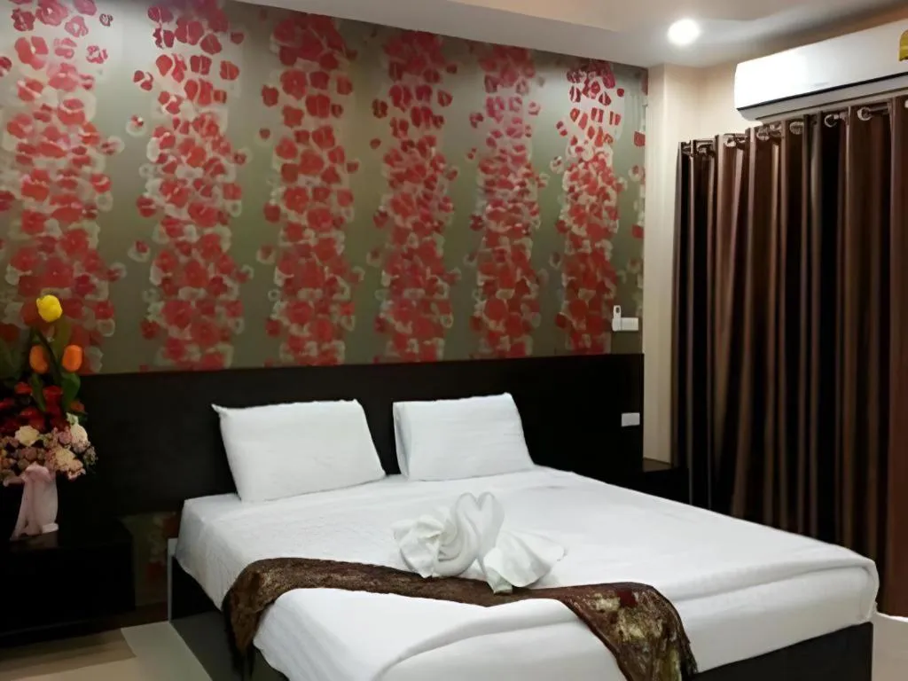 Bed in Le Parc Wangnang Hotel