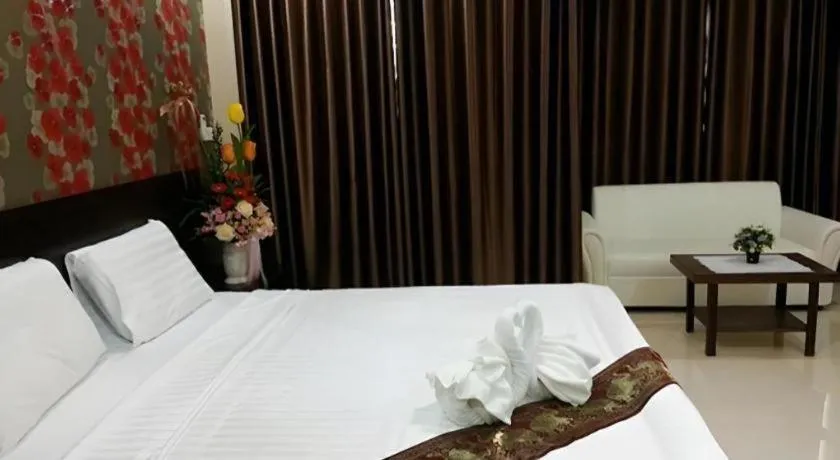 Bed in Le Parc Wangnang Hotel