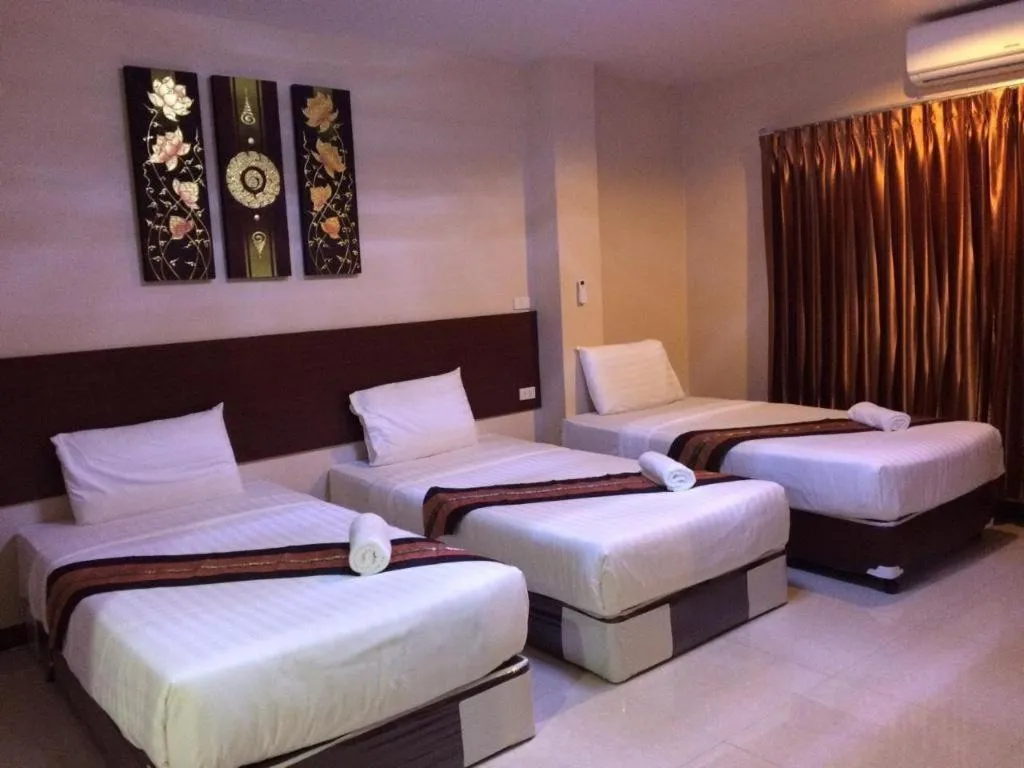 Bed in Le Parc Wangnang Hotel