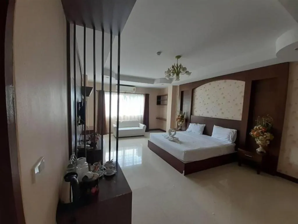 Bed in Le Parc Wangnang Hotel