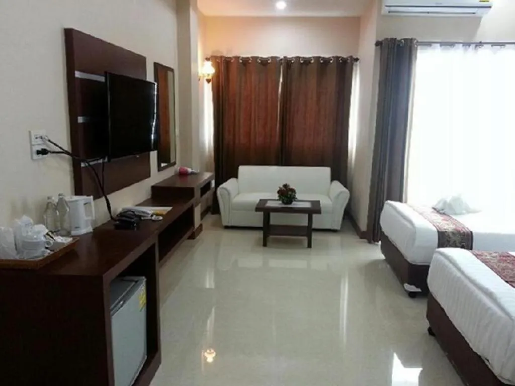 Bed in Le Parc Wangnang Hotel