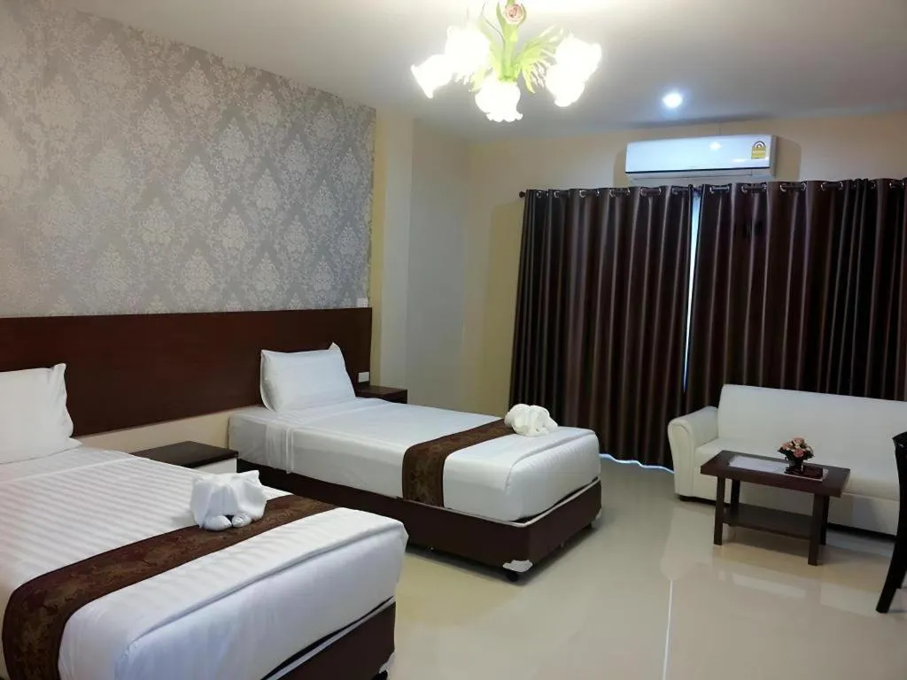 Bed in Le Parc Wangnang Hotel