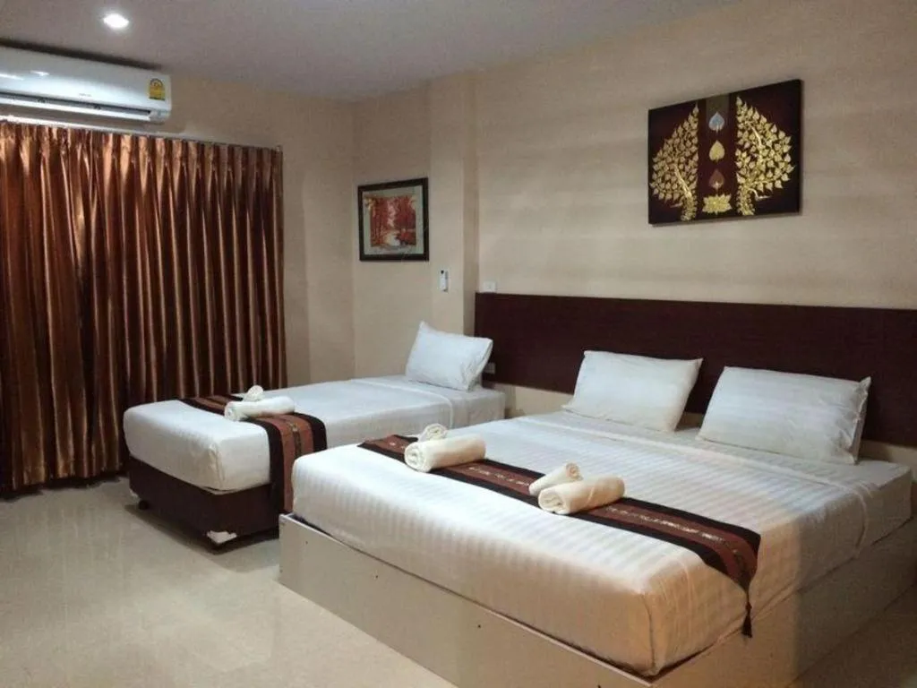 Bed in Le Parc Wangnang Hotel