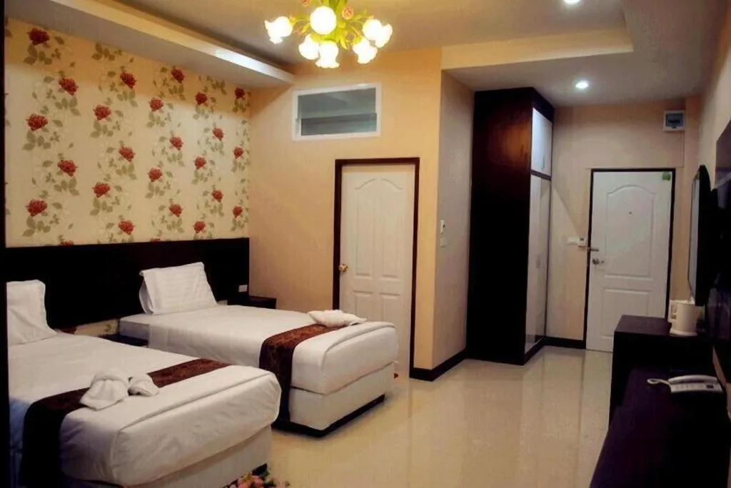 Bed in Le Parc Wangnang Hotel