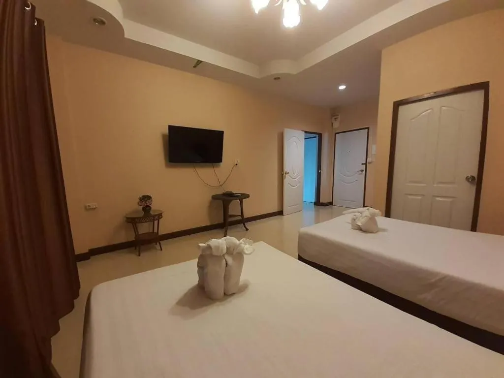 Bed in Le Parc Wangnang Hotel