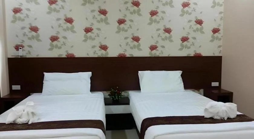 Bed in Le Parc Wangnang Hotel