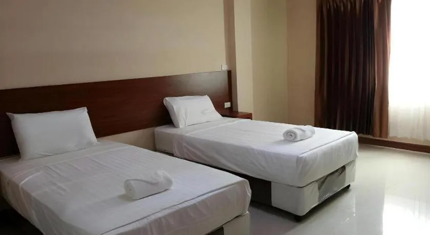 Bed in Le Parc Wangnang Hotel