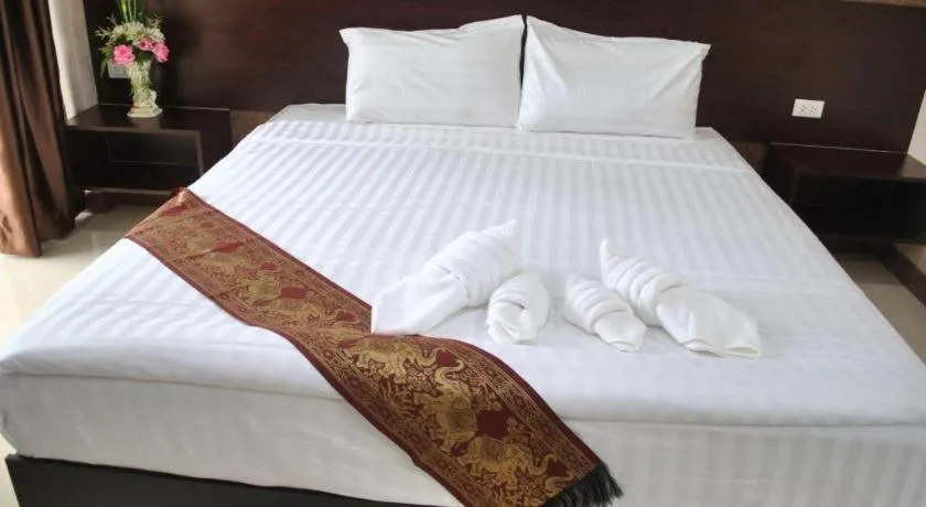 Bed in Le Parc Wangnang Hotel