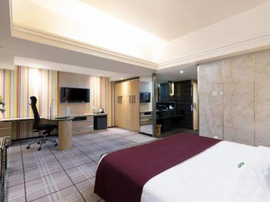 Bed in Nanning Sanzan Hotel