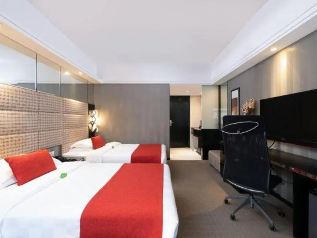 Bed in Nanning Sanzan Hotel