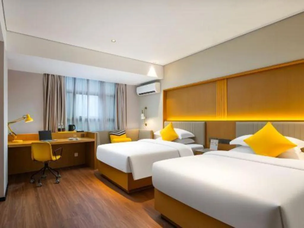 Bed in Nanning Sanzan Hotel